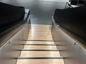 London College of Fashion, Stratford Waterfront | bespoke timber LED handrail | The Light Lab
