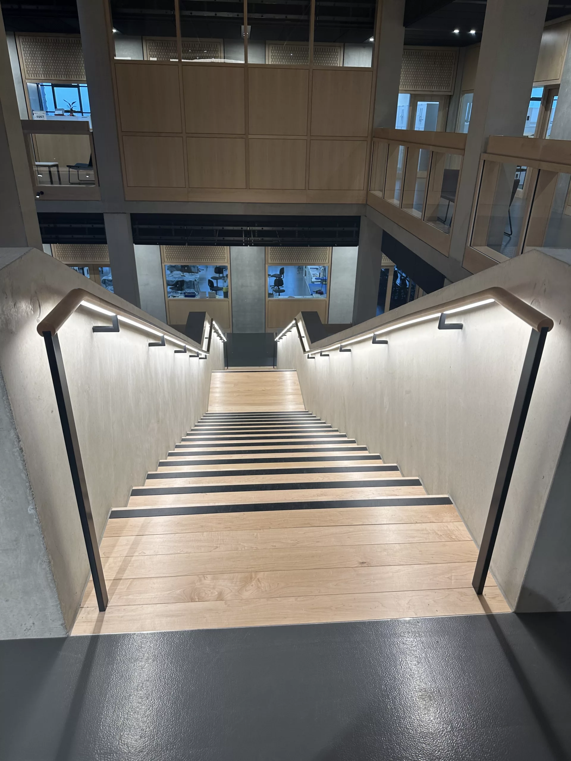 London College of Fashion, Stratford Waterfront | bespoke timber LED handrail | The Light Lab