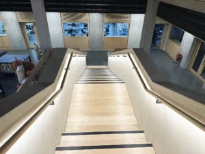London College of Fashion, Stratford Waterfront | bespoke timber LED handrail | The Light Lab