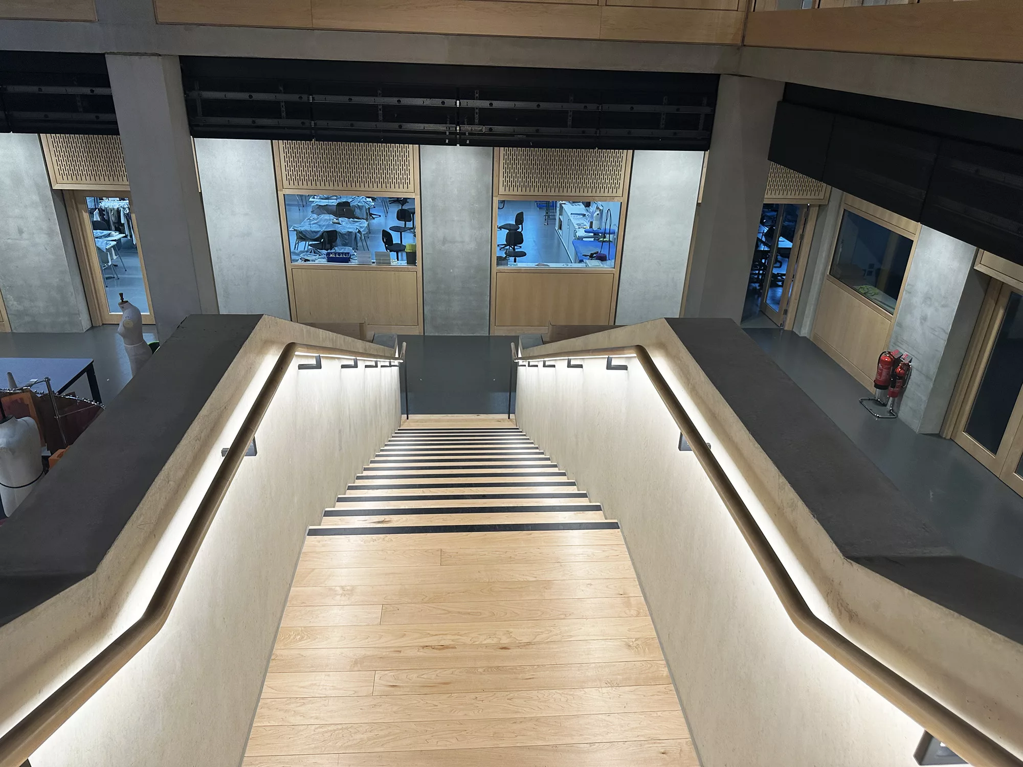 London College of Fashion, Stratford Waterfront | bespoke timber LED handrail | The Light Lab