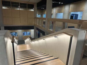 London College of Fashion, Stratford Waterfront | bespoke timber LED handrail | The Light Lab