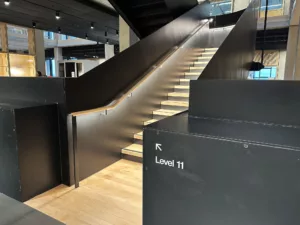 London College of Fashion, Stratford Waterfront | bespoke timber LED handrail | The Light Lab
