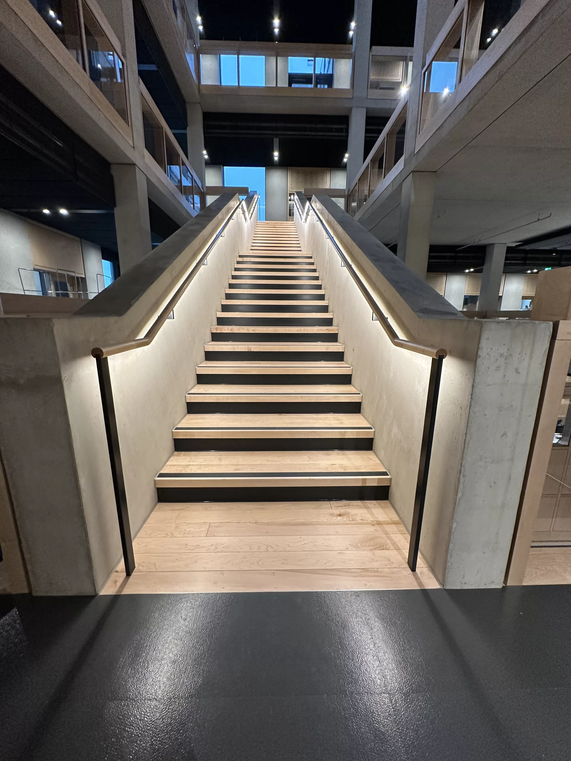 London College of Fashion, Stratford Waterfront | bespoke timber LED handrail | The Light Lab