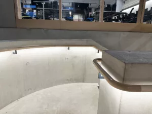 London College of Fashion, Stratford Waterfront | bespoke timber LED handrail | The Light Lab
