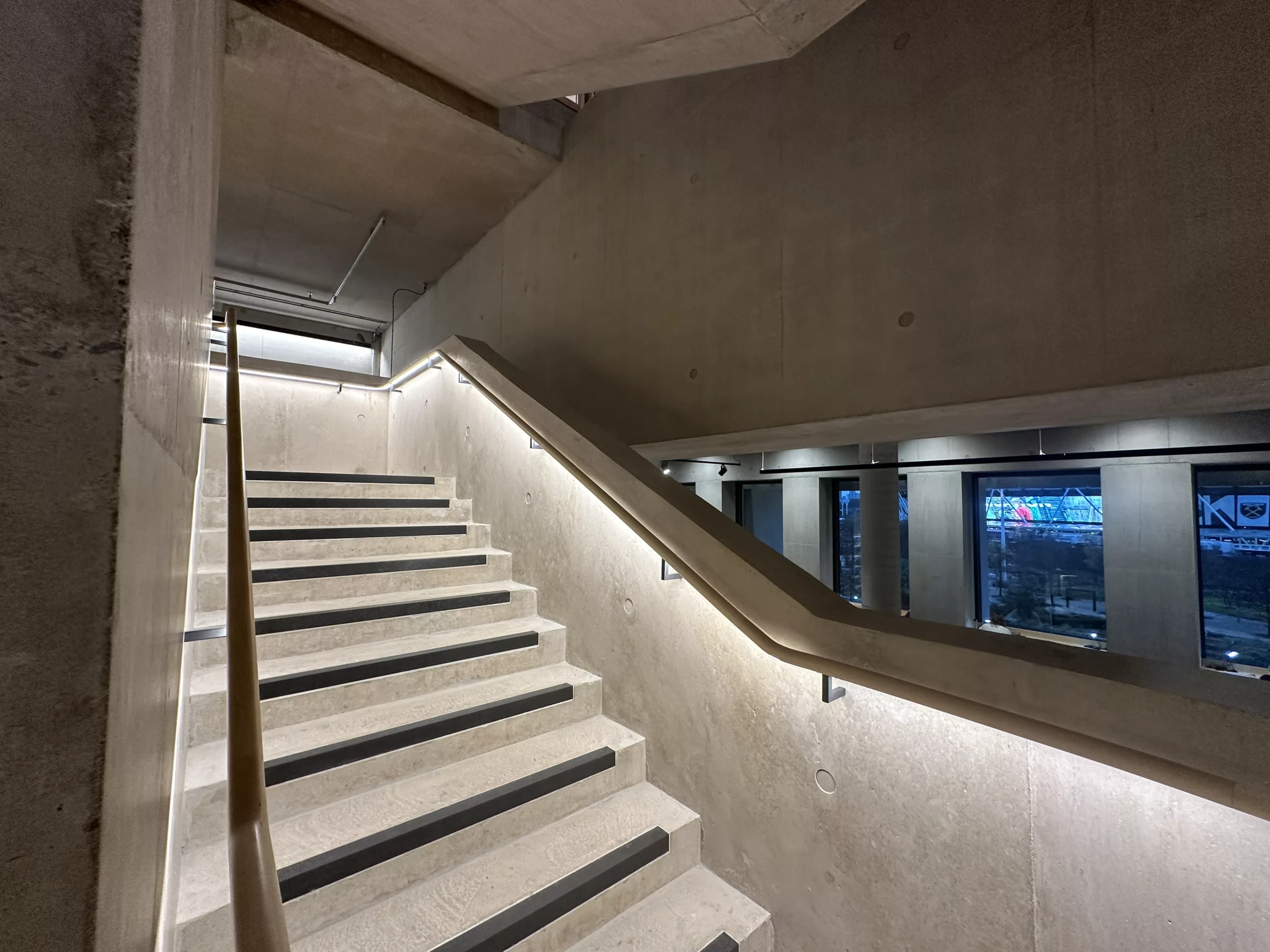 London College of Fashion, Stratford Waterfront | bespoke timber LED handrail | The Light Lab