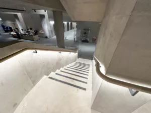 London College of Fashion, Stratford Waterfront | bespoke timber LED handrail | The Light Lab