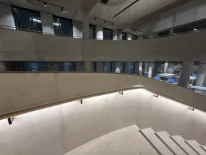 London College of Fashion, Stratford Waterfront | bespoke timber LED handrail | The Light Lab