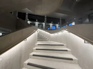 London College of Fashion, Stratford Waterfront | bespoke timber LED handrail | The Light Lab