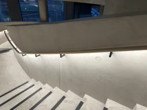 London College of Fashion, Stratford Waterfront | bespoke timber LED handrail | The Light Lab