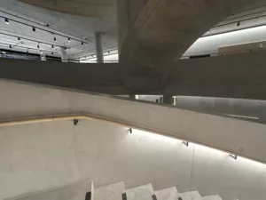 London College of Fashion, Stratford Waterfront | bespoke timber LED handrail | The Light Lab