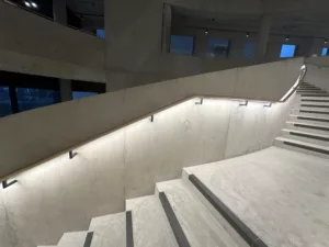 London College of Fashion, Stratford Waterfront | bespoke timber LED handrail | The Light Lab