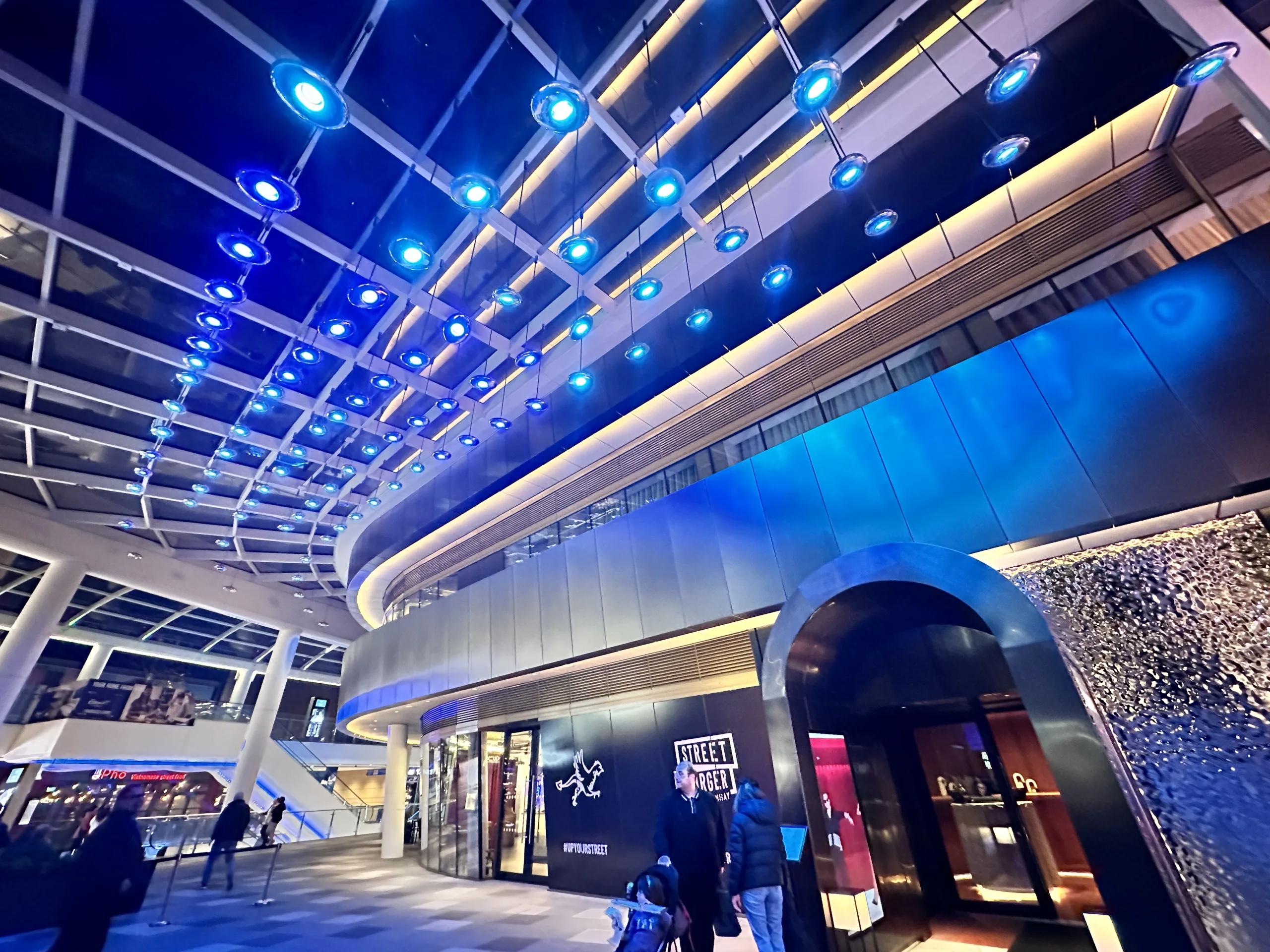 St James Quarter, Edinburgh | Bespoke retail lighting | custom illuminated ceiling pendants | The Light Lab